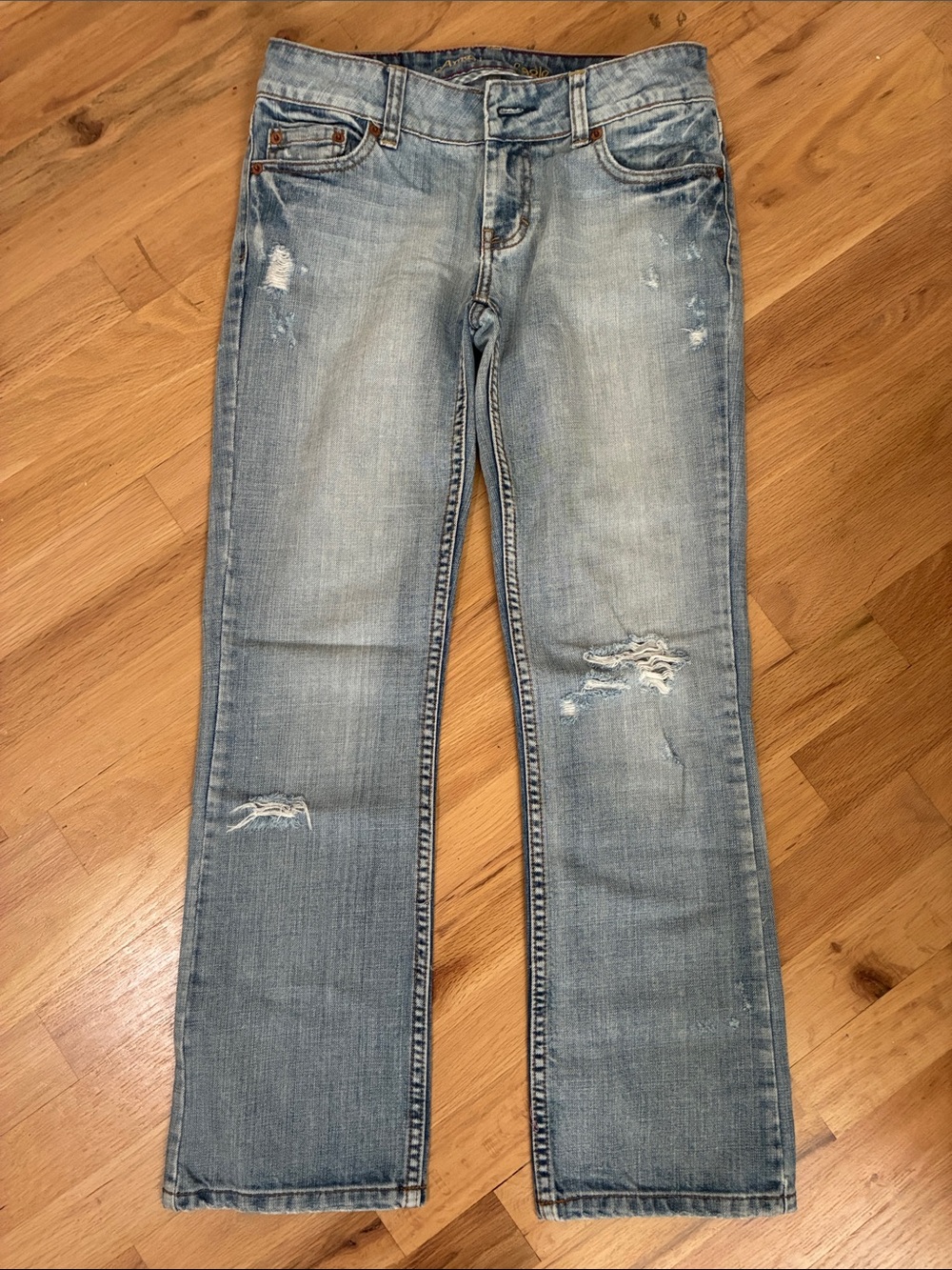low rise vintage 2000s american eagle ripped jeans